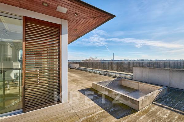 Appartement en dernier étage avec rooftop de 200m2 et vue sur Tour Eiffel