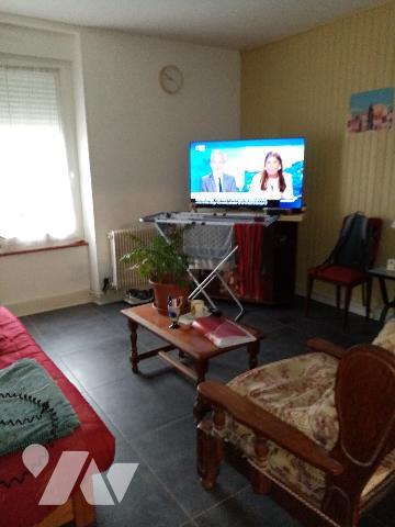 maison de rapport comprenant 3 appartements , un jardin et un garage