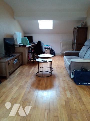 maison de rapport comprenant 3 appartements , un jardin et un garage