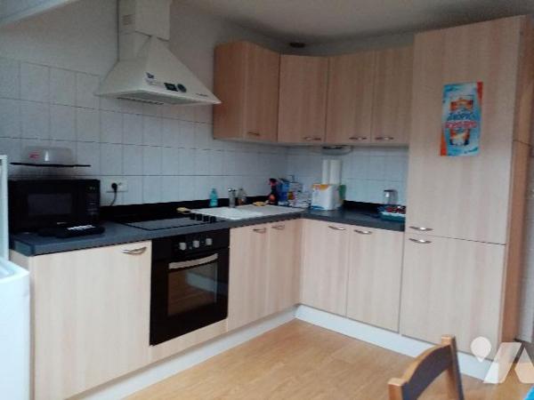 maison de rapport comprenant 3 appartements , un jardin et un garage