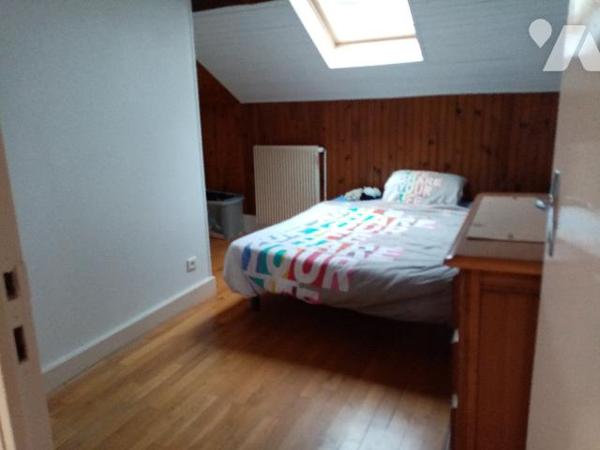 maison de rapport comprenant 3 appartements , un jardin et un garage