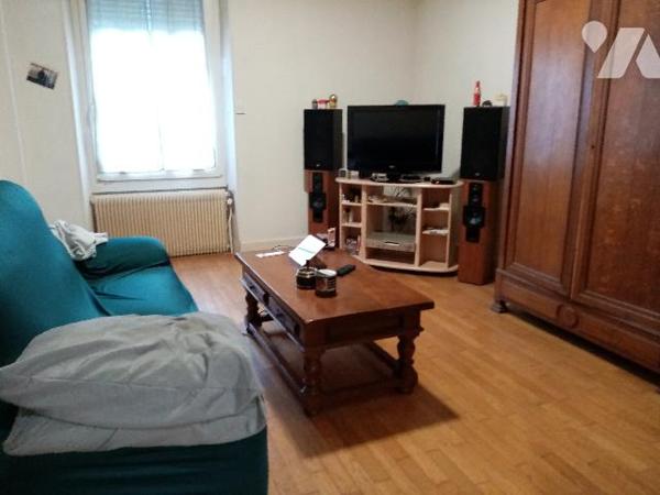 maison de rapport comprenant 3 appartements , un jardin et un garage