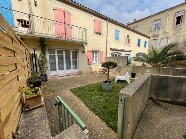 Location appartement T3 en duplex de 76 m² avec jardinet et parking privatif à Carcassonne