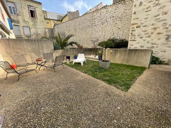 Location appartement T3 en duplex de 76 m² avec jardinet et parking privatif à Carcassonne