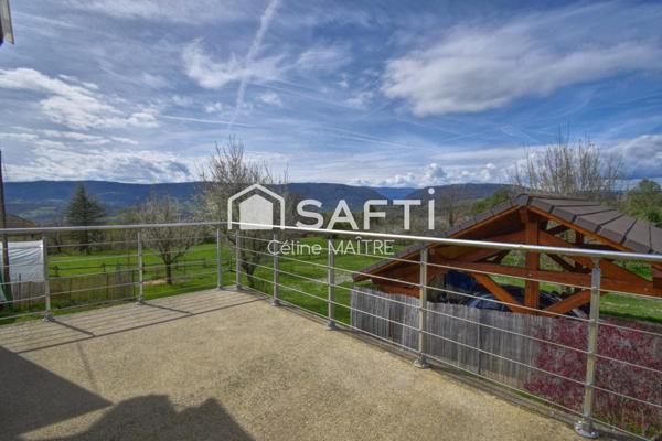 Maison mitoyenne avec grand jardin
