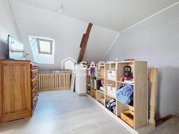 Maison mitoyenne avec grand jardin