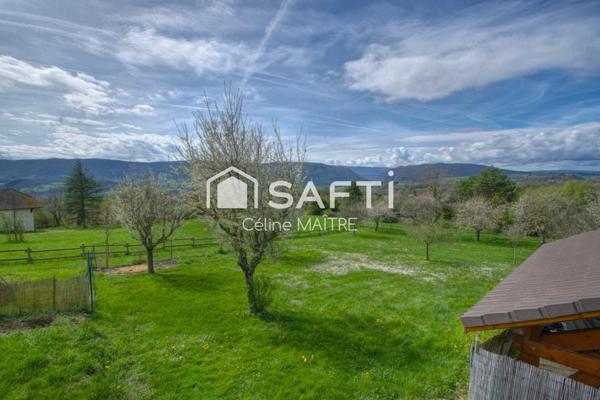 Maison mitoyenne avec grand jardin