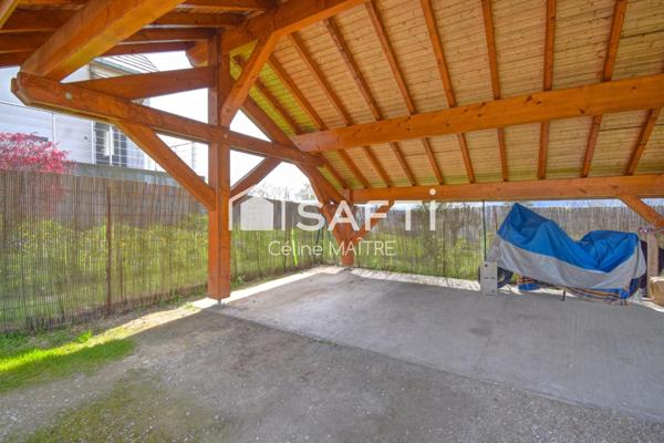 Maison mitoyenne avec grand jardin