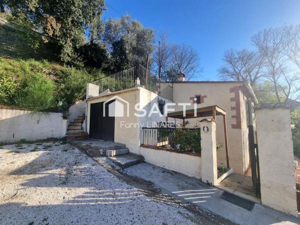 Bien atypique surplombant la rivière, vue Canigo