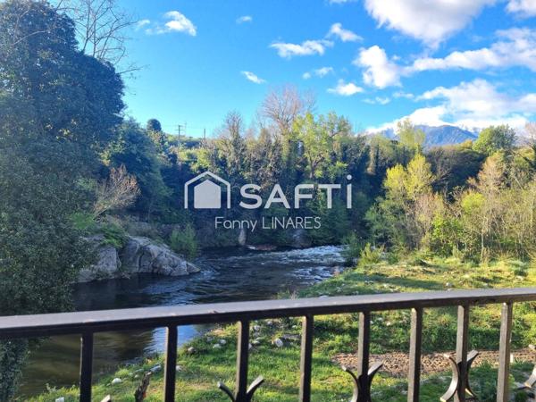 Bien atypique surplombant la rivière, vue Canigo