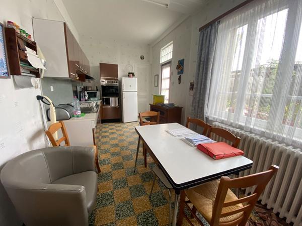 Maison de ville à rénover avec garage au centre de Saint Quentin