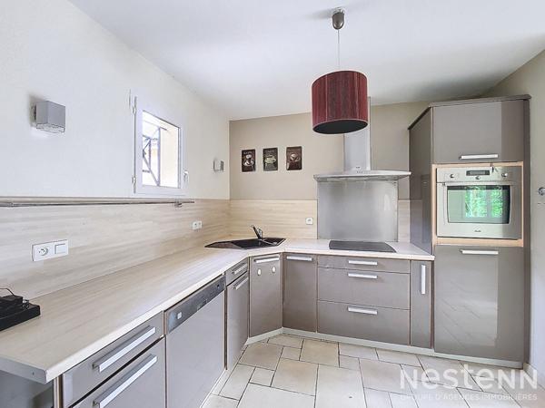 A Vendre Maison contemporaine de plain-pied de 107 m² avec garage, terrasse et jardin