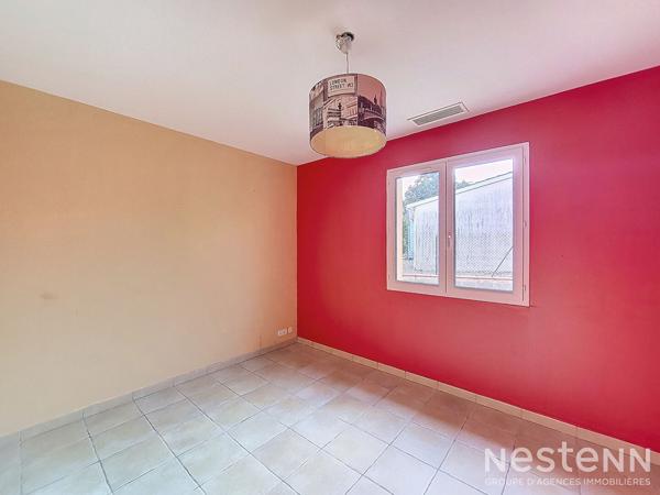 A Vendre Maison contemporaine de plain-pied de 107 m² avec garage, terrasse et jardin