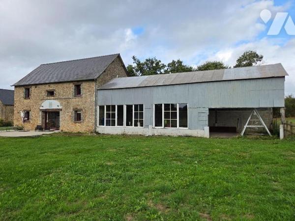 HAMBERS- En campagne, maison en pierres avec ses dépendances.

Maison d'habitation comprenant...