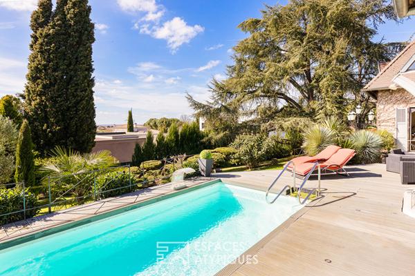 Maison de caractère aux volumes contemporains à Castelginest