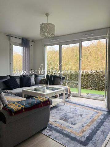 Joli appartement de 63m² avec deux chambres et balcon et parking proche gare.