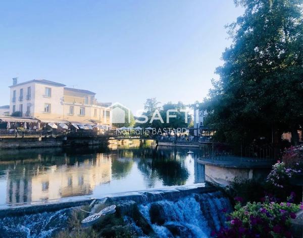 L'Isle proche centre et commerces : beau duplex avec terrasse et 2 places de parking