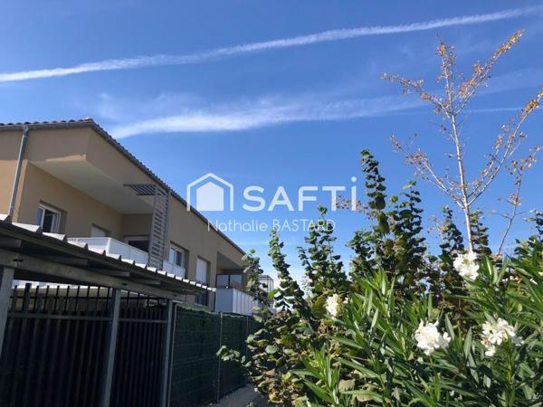 L'Isle proche centre et commerces : beau duplex avec terrasse et 2 places de parking