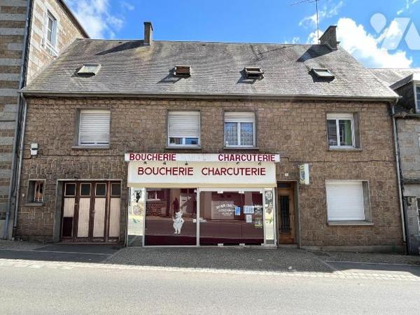 Un immeuble de rapport à usage de commerce et d'habitation d'environ 280m² actuellement loué, s...