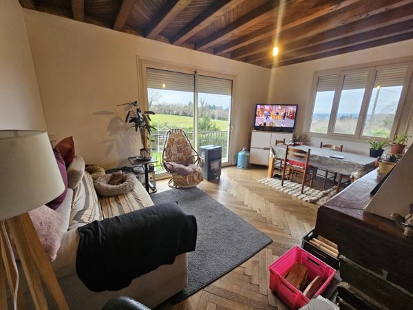 Maison sur sous-sol total avec locataire