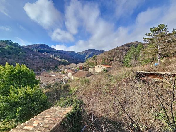 Ancien presbytère aménagé en habitation avec jardin et environnement exceptionnel