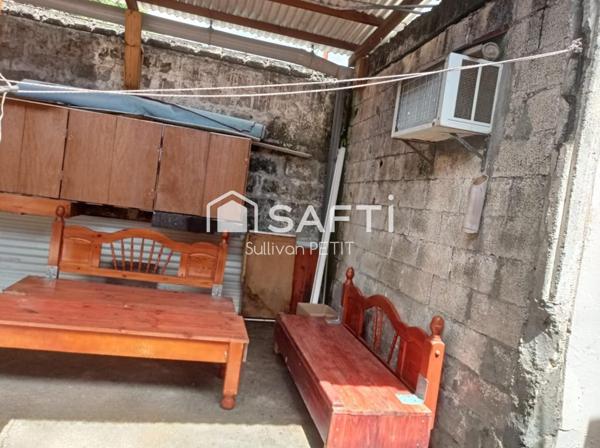 Maison de plain-pied climatisée avec 3 chambres et terrasse, proche de toutes commodités à Saint-Pierre