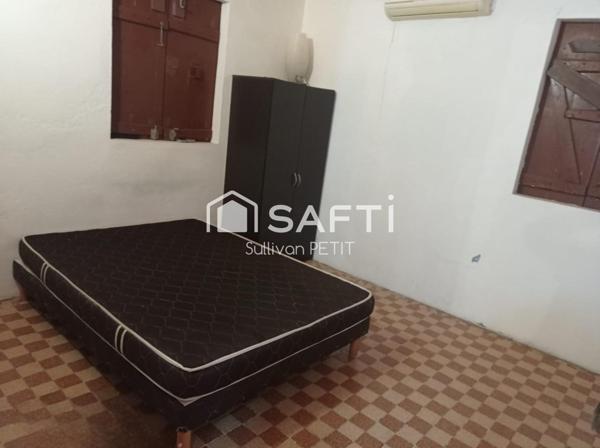 Maison de plain-pied climatisée avec 3 chambres et terrasse, proche de toutes commodités à Saint-Pierre