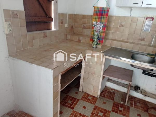 Maison de plain-pied climatisée avec 3 chambres et terrasse, proche de toutes commodités à Saint-Pierre