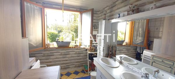 Maison de village spacieuse avec un beau terrain