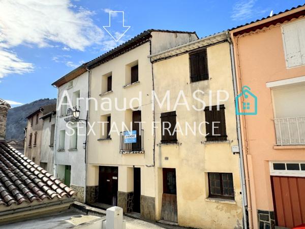 COQUETTE MAISON DE VILLAGE RENOVEE AVEC GARAGE ET BALCONET DANS VILLAGE PRISE