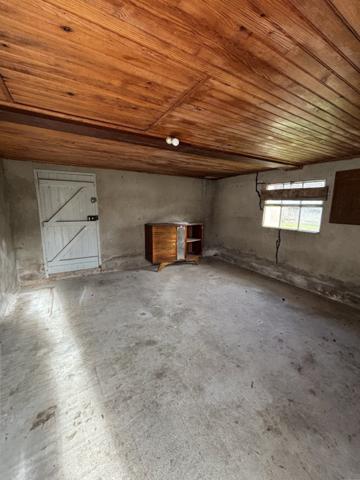 Maison ancienne avec double garage