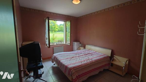 PAVILLON PLAIN PIED AVEC GARAGE ET JARDIN