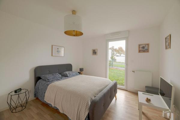 A vendre à LIFFRÉ, appartement Type 3 de 70m², jardin de 124m², deux chambres, deux places de stationnement et un cellier