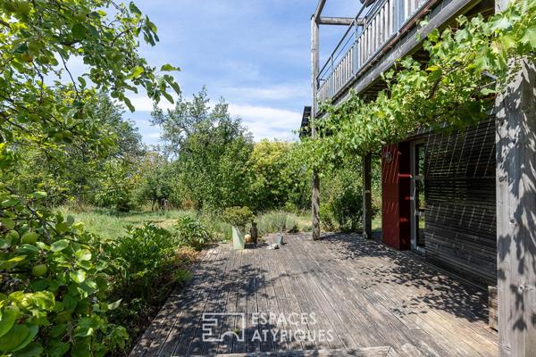 Maison d’architecte bioclimatique et son environnement nature