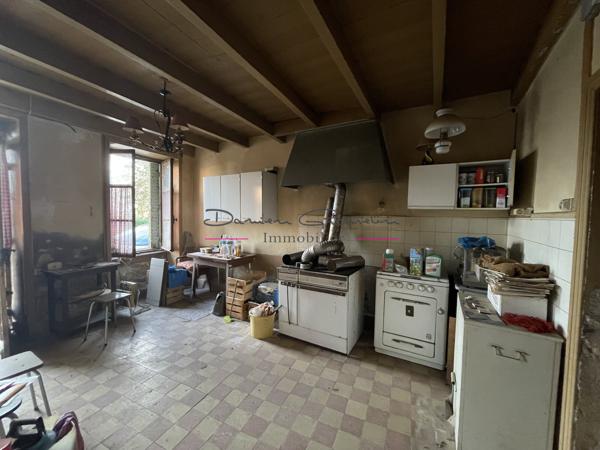 Maison de village - 4 chambres - garage - terrain - 42460