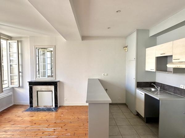 Immeuble mixte – 4 logements et commerce – Hyper-centre de Saintes