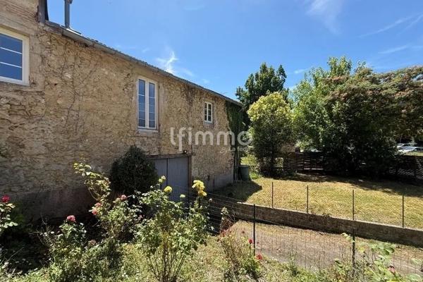 Maison de caractère en pierre rénovée – 350 m² au cœur de Langon