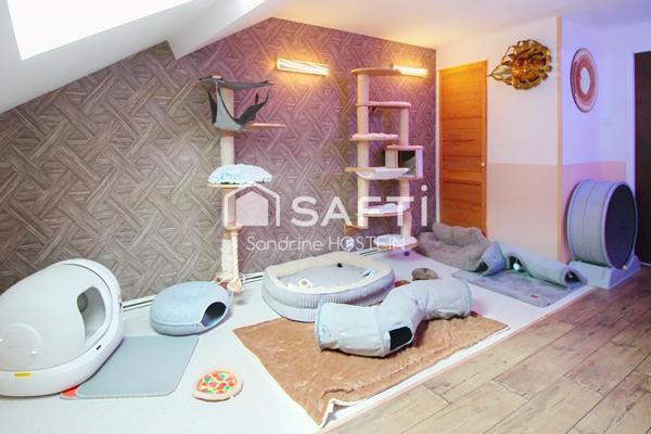 Appartement Duplex avec 3 chambres-mezzanine-caves-garage et jardin!