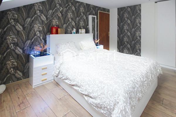 Appartement Duplex avec 3 chambres-mezzanine-caves-garage et jardin!