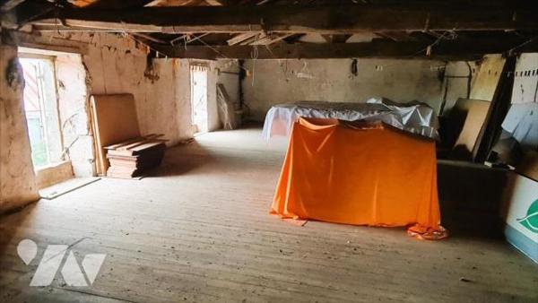 Maison + 2 terrains à bâtir + 1 grange + 2 hangars + dépendances