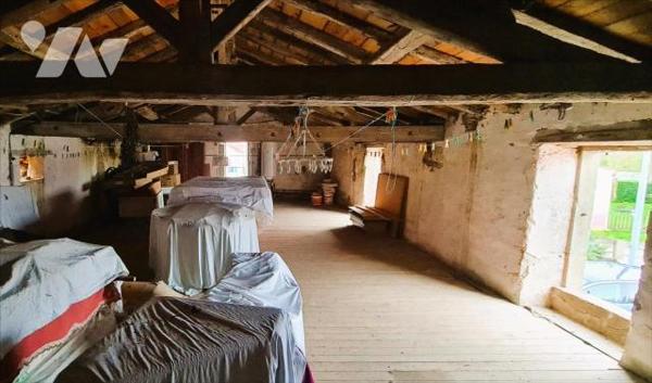 Maison + 2 terrains à bâtir + 1 grange + 2 hangars + dépendances