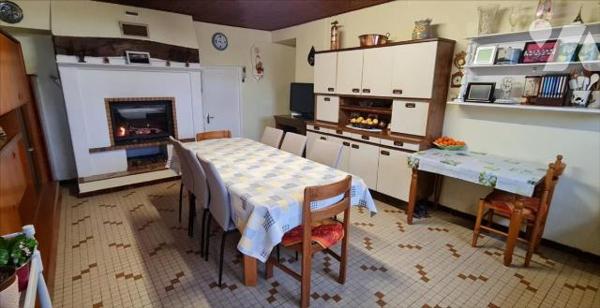 Maison + 2 terrains à bâtir + 1 grange + 2 hangars + dépendances