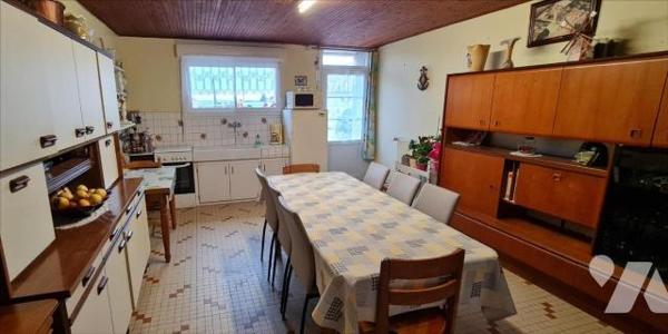 Maison + 2 terrains à bâtir + 1 grange + 2 hangars + dépendances