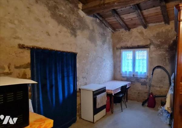 Maison + 2 terrains à bâtir + 1 grange + 2 hangars + dépendances