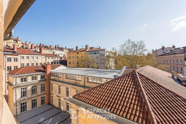 Appartement familial en dernier étage à proximité des quais de Saône