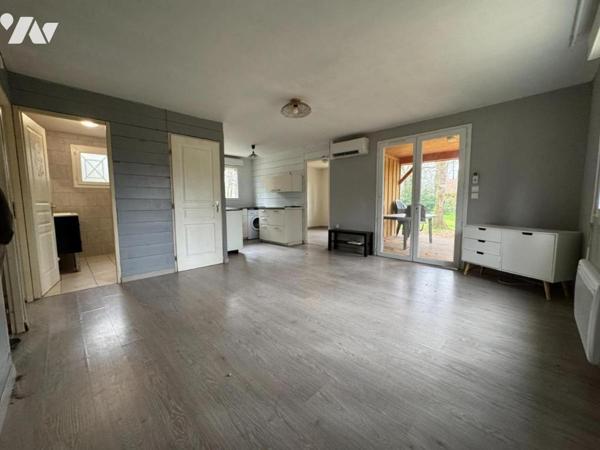 Ensemble immobilier au cœur des bois avec piscine