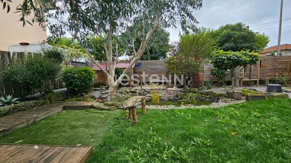 A Vendre à Aurillac, quartier Marmiers, Maison mitoyenne de type 7 avec garage et jardin paysagé.