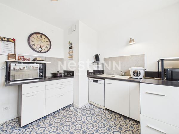 A Vendre à Aurillac, quartier Marmiers, Maison mitoyenne de type 7 avec garage et jardin paysagé.