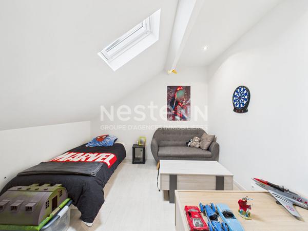 A Vendre à Aurillac, quartier Marmiers, Maison mitoyenne de type 7 avec garage et jardin paysagé.