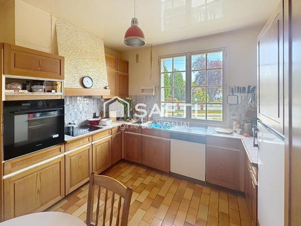 Maison 6 chambres, sous sol complet et jardin clos.